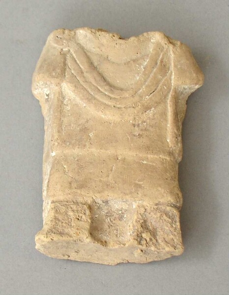 Torso of a clay figure