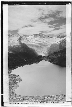 Zillertaler Alpen. Schwarzsee (2543 Meter) mit großer Mösele (3480 Meter) und Waxeckkees
