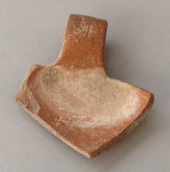 Fragment of a clay vessel