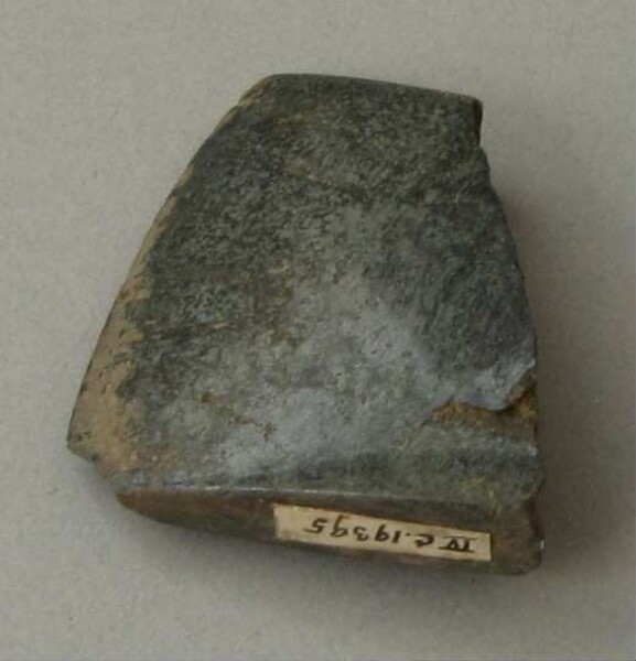 Stone axe blade (fragment)