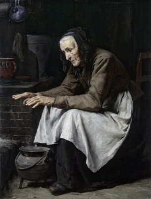 Alte Frau, sich wärmend