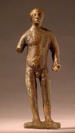 Nackte männliche Statuette, der rechte Arm abgebrochen