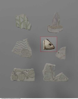 Einlagefragment in Gestalt eines Fischkopfes