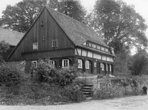 Wohnhaus (sog. Rutsche; wohl 1. H. 19. Jh.), Rumburger Str. 62. Straßenansicht von Südwesten