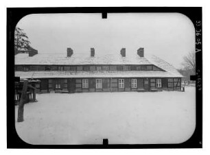 Baruth/Mark-Glashütte, Hüttenweg 8. Arbeiterwohnhaus (um 1840). Gartenfront