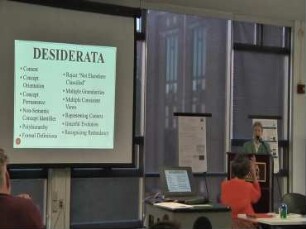 The Q-Codes: Metadata, Research data, and Desiderata, Oh My! Improving Access to Grey Literature