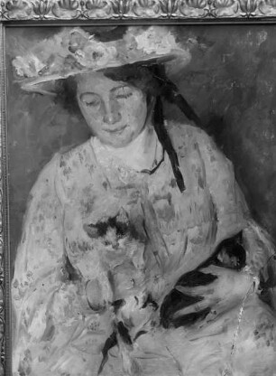 Junge Frau mit Katzen