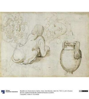 Sphinx. Vase. Zwei Masken