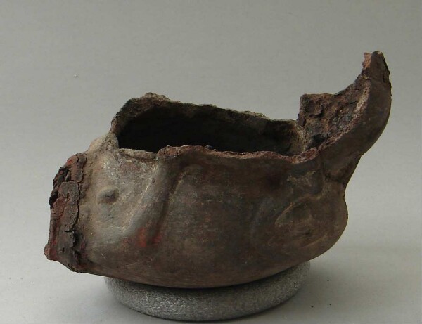 Fragment of a clay vessel