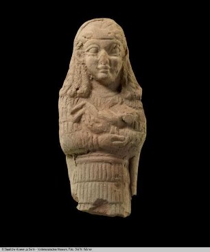 Frau im Gewand mit Kleinkind