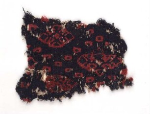 Fragment eines Zierstreifens mit rot-blauen Punkten