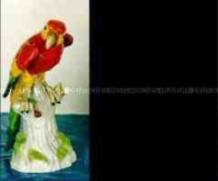 Porzellanfigur Papagei, nach rechts blickend