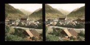 Blick auf Bruck-Fusch mit Fluss, Kirche und Gebirge