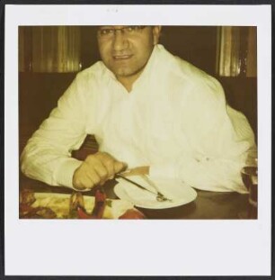 Özcan Mutlu im Adana Grillhaus in Berlin