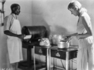 Frau und Mann beim Kochen : Frau und Mann beim Kochen auf Protos-Herden der Firma Siemens