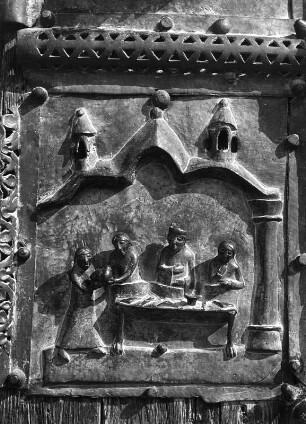 Bildfeld mit vier Personen, an einem Tisch stehend : Bildfeld mit vier Personen, an einem Tisch stehend. Bronze (vor 1138). Verona, Kirche San Zeno Maggiore, Westfassade, Portal, Tür