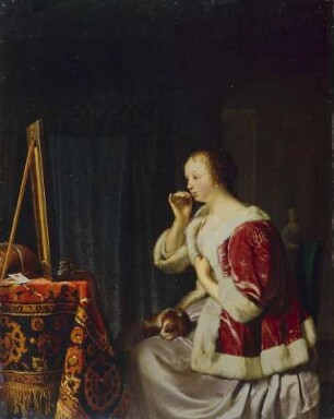 Eine junge Frau beim Ankleiden