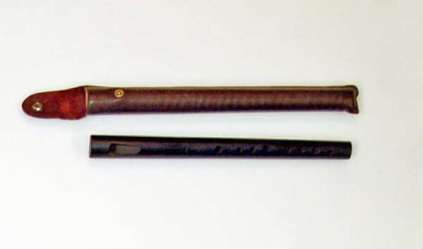 open inner flute with finger holes with leather pocket