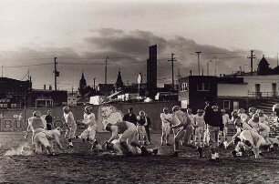 Football-Training im Abendlicht, Butte, Montana