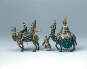 Dinglinger, Johann Melchior; Dinglinger, Georg Friedrich ; Dinglinger, Georg Christoph: Der Hofstaat zu Delhi am Geburtstag des Großmoguls Aureng-Zeb. Gold, Silber, z. T. vergoldet, Email, 4909 Diamanten, 164 Smaragde, 160 Rubine, 16 Perlen, 2 Kameen, 1 Saphir; 58 x 142 x 114 cm. Dresden, 1701-1708. Detail: "Türkisches" Kamel und "Persianisches" Dromedar (Geschenk des Mir Miron und des Primo Veziar). Dresden: Grünes Gewölbe VIII 204