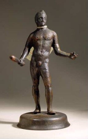 Als Herakles/Hercules ergänzte, etruskisch-italische (?) Statuette, auf Basis