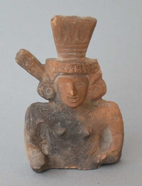 Upper body with head of a clay figure