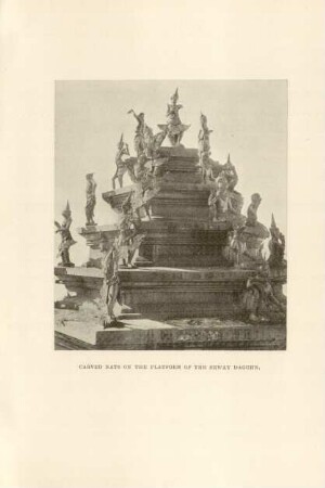 Carved nats on the platform of the Shway Dagohn