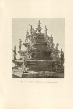 Carved nats on the platform of the Shway Dagohn