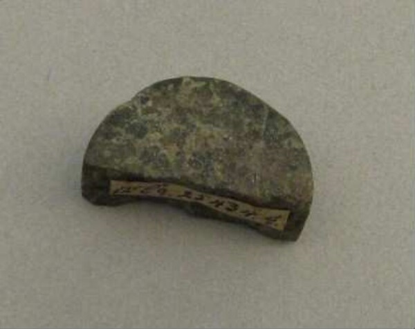 Stone disc (fragment)