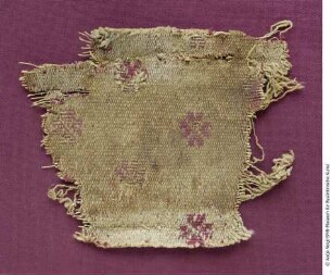 Fragment eines Gewebes mit Streumuster