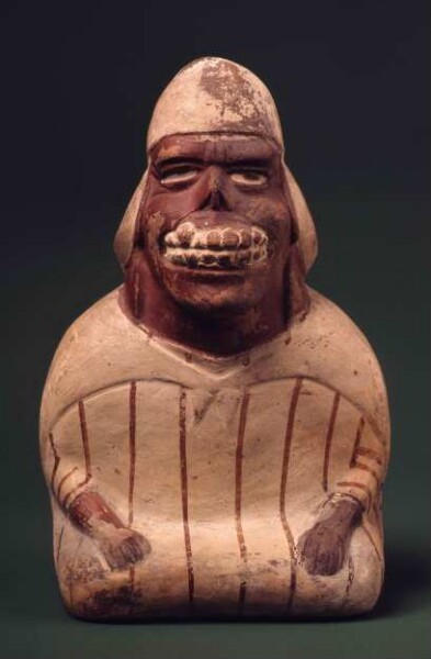 Seated anthropomorphic figure, artificial facial mutilation