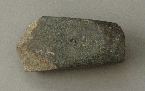 Stone axe blade (fragment)