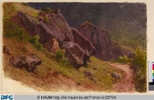 Felsen an einer Wegbiegung