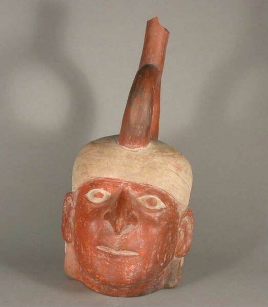 Figure vessel with stirrup spout