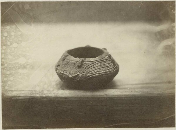 Double-conical vessel with incised decoration