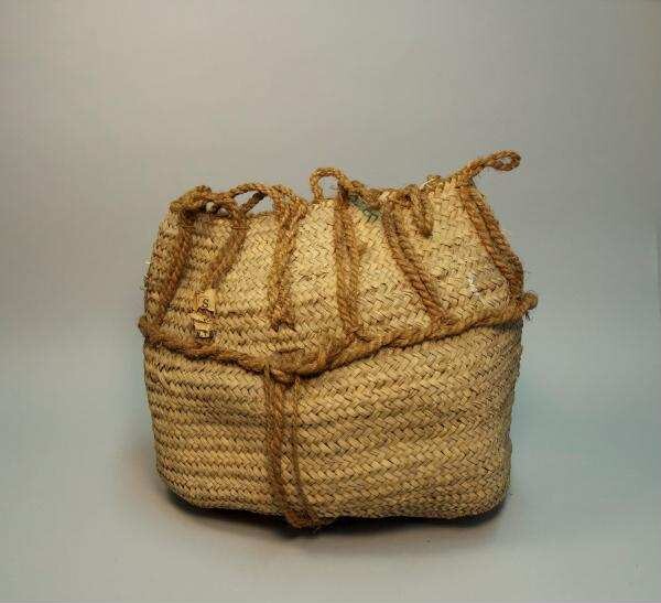 Basket woven in a herringbone pattern and wrapped with knitting