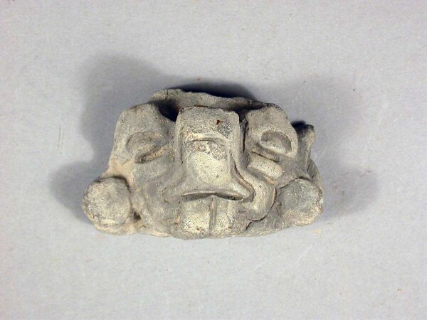 Fragment of a clay vessel