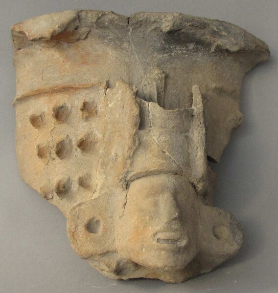 Fragment of a clay vessel