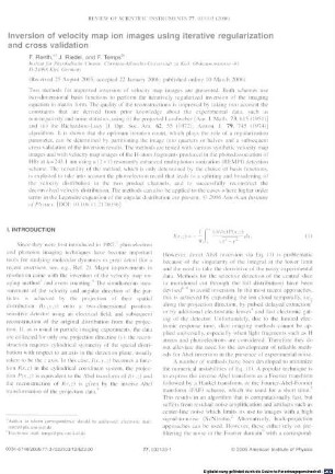 Inversion of velocity map ion images using iterative regularization and cross validation