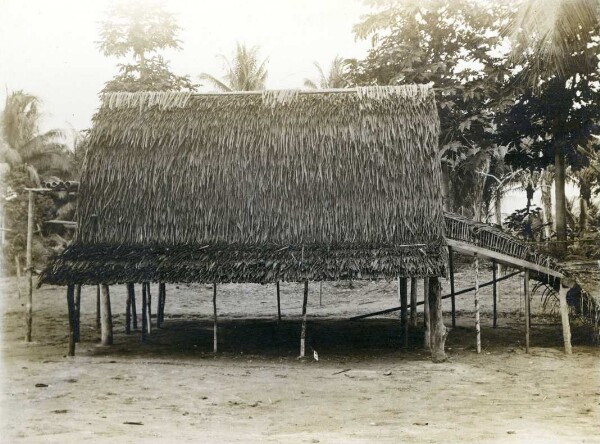 "Newly built, unfinished house, with scaffolding on one gable. Fisoa."