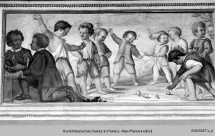 Friesfolge mit spielenden Kindern : Kinderspiel mit Kreiseln