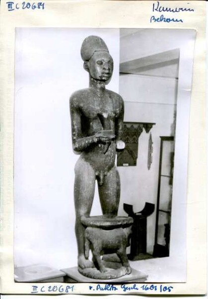 Male sculpture with stool