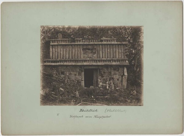 "West facade of the main palace. Teobert Maler sitting in front of it."