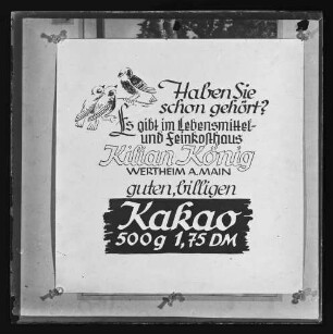 Werbung "Haben Sie schon gehört? Es gibt im Lebensmittel- und Feinkosthaus Kilian König, Wertheim, guten, billigen Kakao"