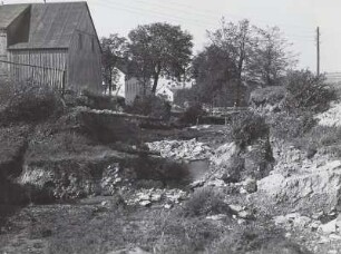 Durchbrochener Damm des Dorfteiches am Gasthof nach der Unwetterkatastrophe 8./9. Juli 1927