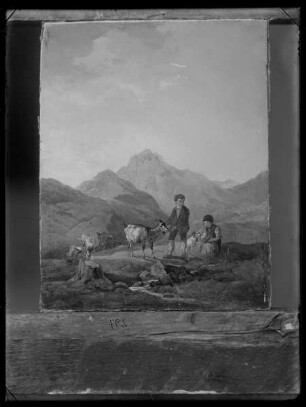 Ziegenhirt und Ziegenhirtin in alpiner Landschaft bei der Brotzeit