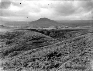 Hügellandschaft : Eine Hügellandschaft mit Grasvegetation