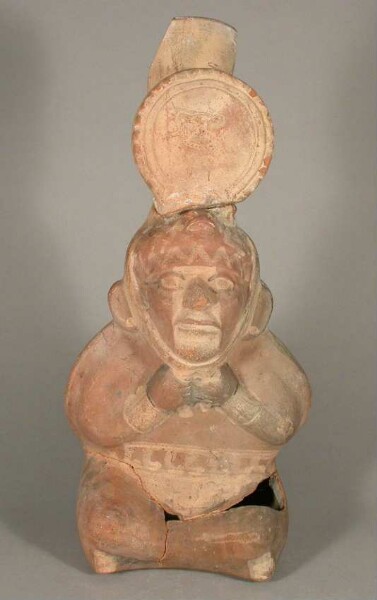 Seated anthropomorphic figure