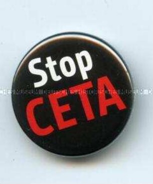 Button "Stop CETA" von der bundesweiten Demonstration "Stop TTIP CETA DEMO" am 10.10.2015 in Berlin