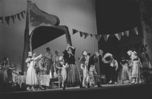 Szenenbilder aus der heiteren Oper "Schneider Wibbel" von Mark Lothar an der Komischen Oper Berlin